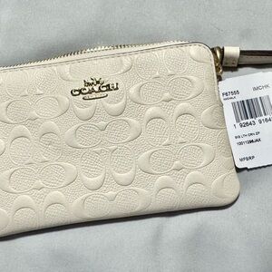 Coach Cream Embossed Wristlet